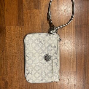 Silver and White Star Patterned Coach Wristlet